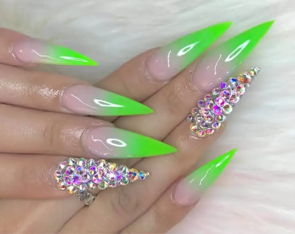 Neon green stiletto nails with gems