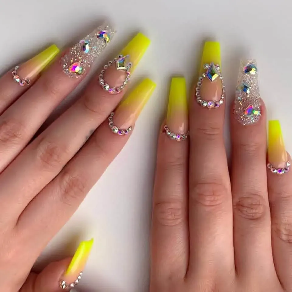 Yellow ombre nails with rhinestones