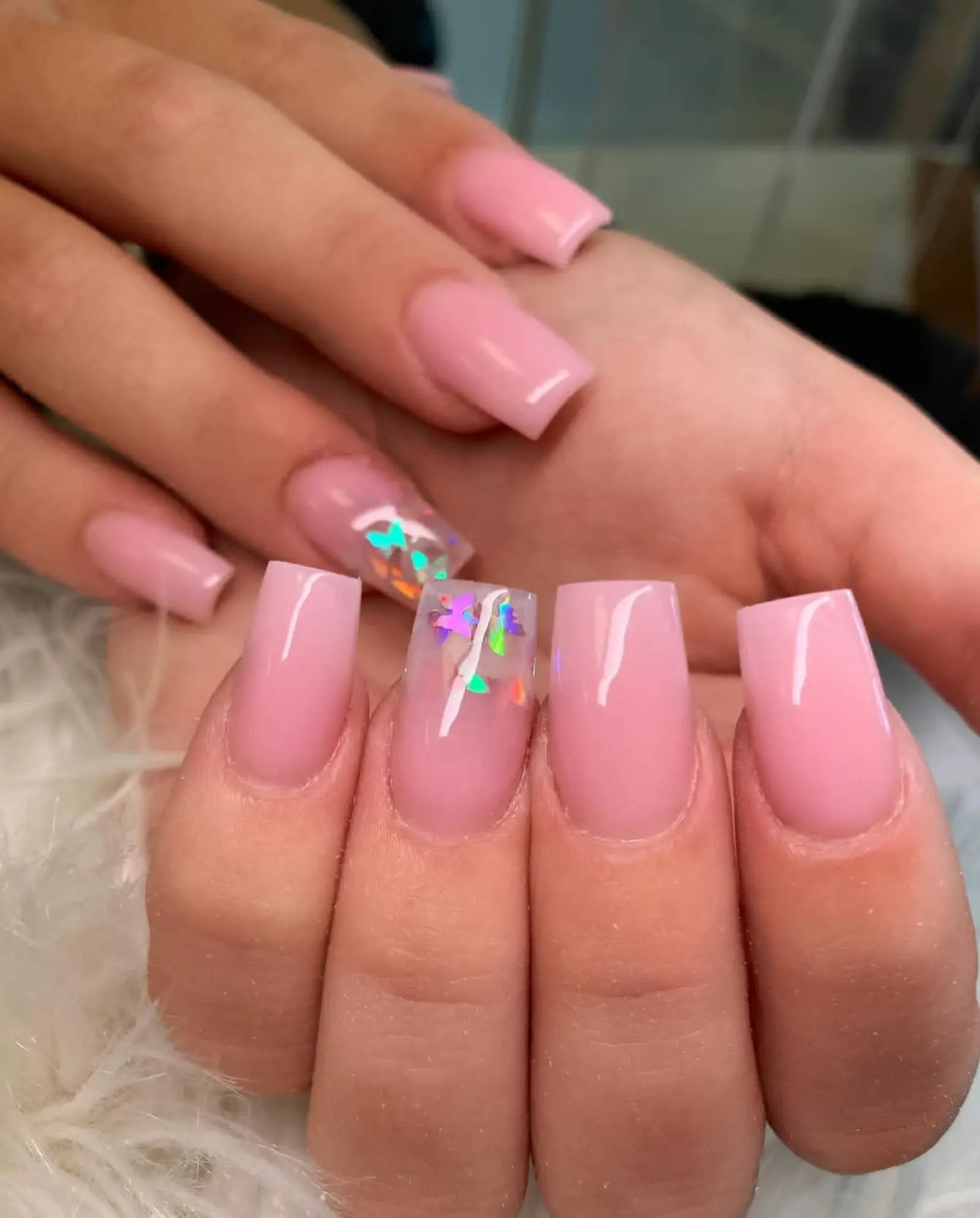Pink butterfly accent nails